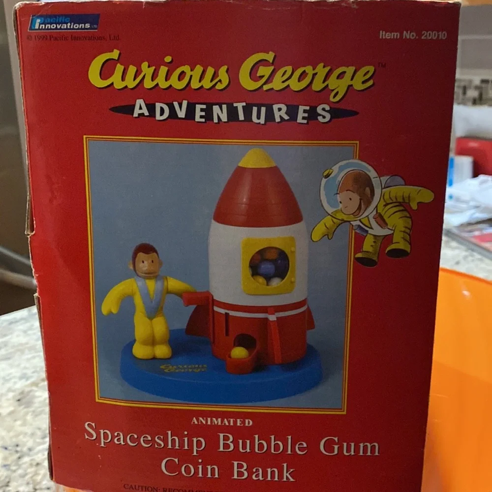 Vintage Curious George Adventure Animated space ship gum ball coin bank.